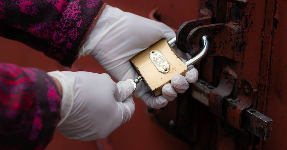 locksmith unlocking front door — Piscataway Locksmith Corp